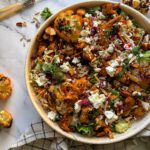 parelcouscous salade met harissa bloemkool